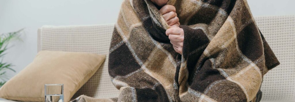 Why do elderly people feel cold?